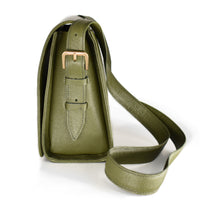 left side view of pine colored leather privacy purse